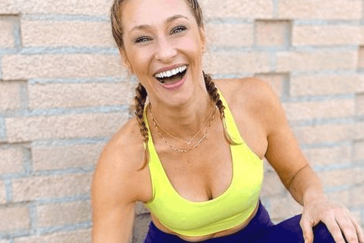 An image of M/ Body founder 'Marnie Alton' along side a logo of her yoga and fitness video membership app.